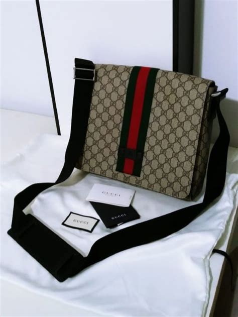 bolsa de costa masculina original da gucci|More.